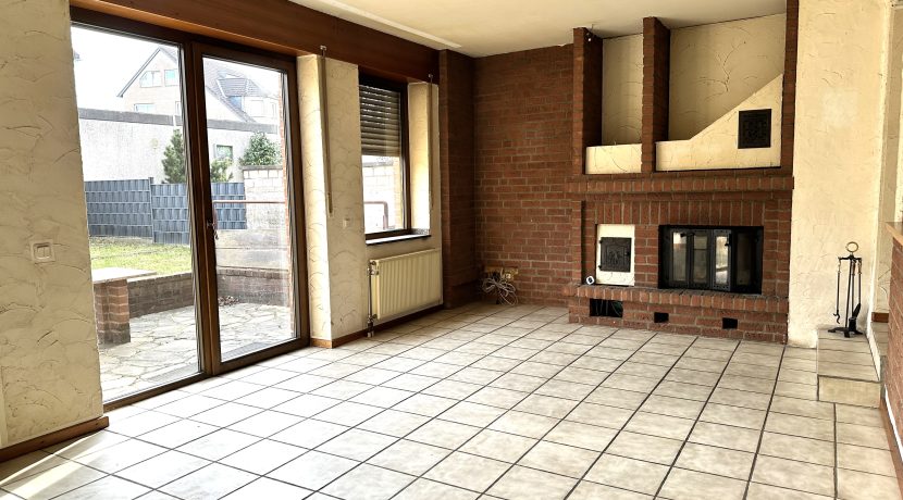 Wohnzimmer mit Kamin