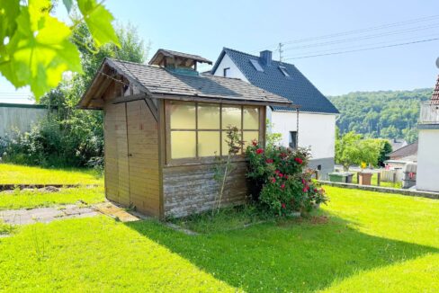 Gartenhaus mit Grillplatz