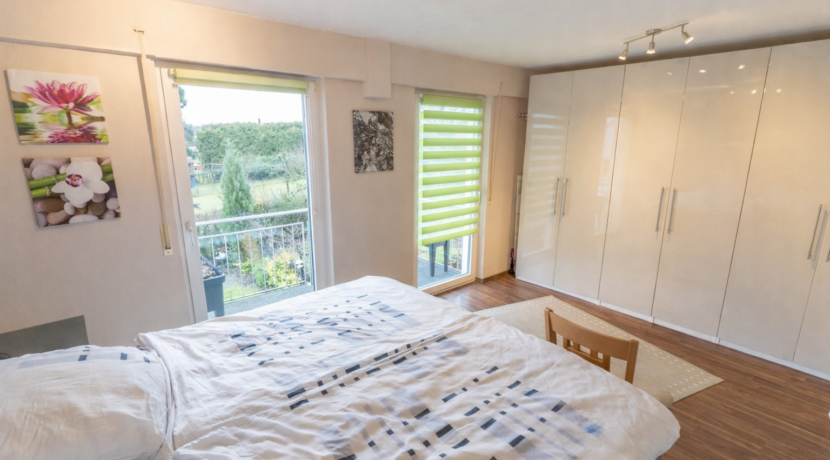 Schlafzimmer mit Balkonzugang