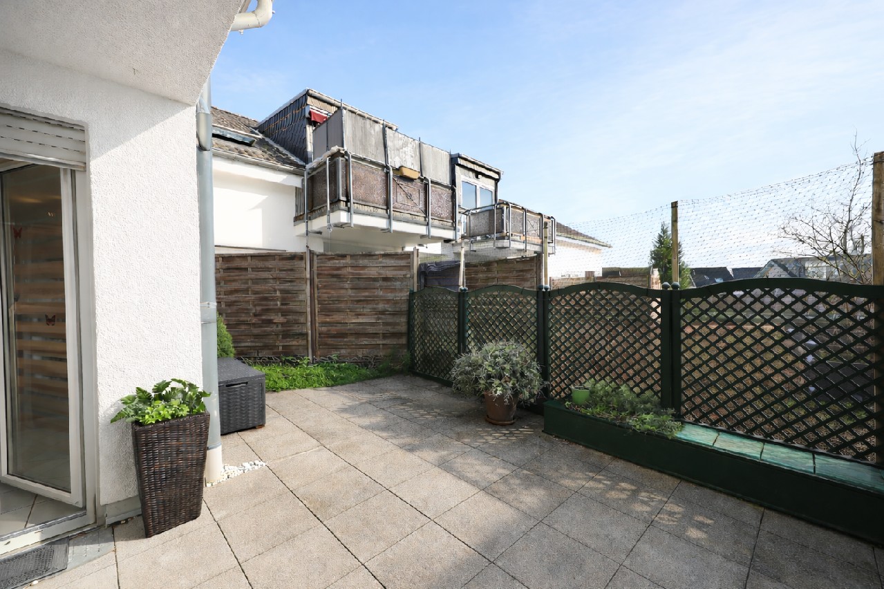 NEU: Vermietete 2-Zimmer-Eigentumswohnung mit Terrasse und TG-Stellplatz