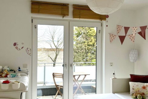 Schlafzimmer mit Balkon