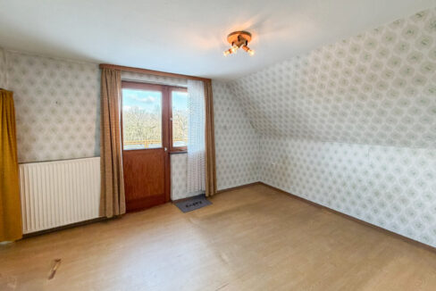 Schlafzimmer mit Zugang zur Dachterrasse