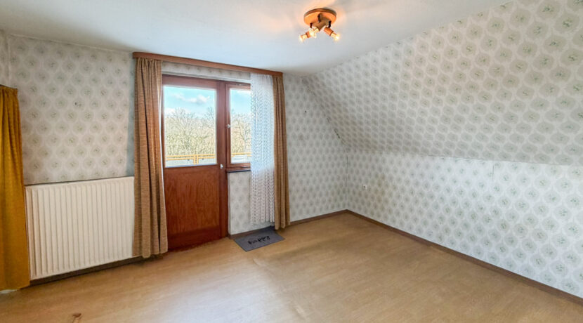 Schlafzimmer mit Zugang zur Dachterrasse