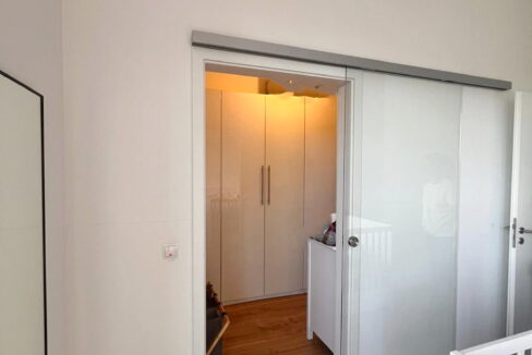 Schlafzimmer mit begehbarem Kleiderschrank