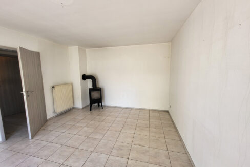 Wohnzimmer mit Kamin EG