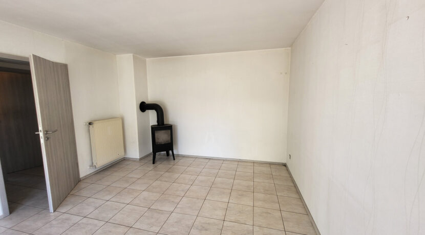 Wohnzimmer mit Kamin EG