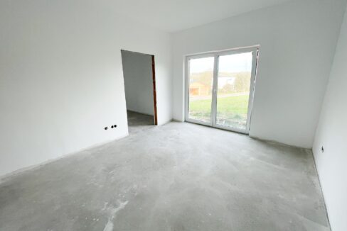 Schlafzimmer mit Ankleide im Rohbauzustand