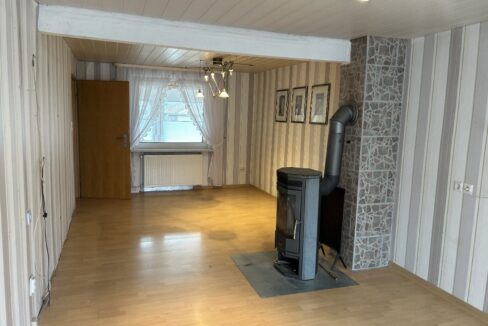 Wohnzimmer mit Kamin