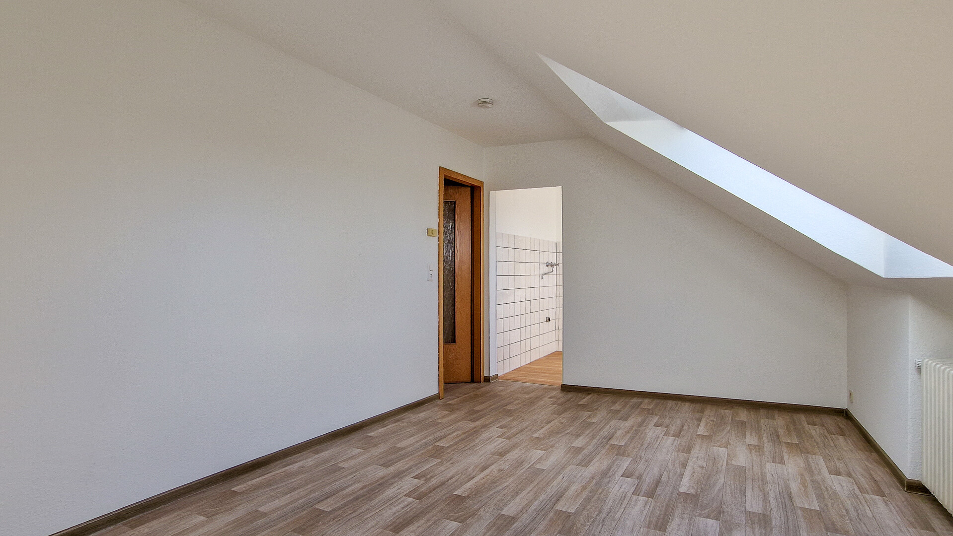 Ein Zuhause mit Aussicht: Helle Dachgeschosswohnung im beliebten Schwelmer Norden - Foto 4
