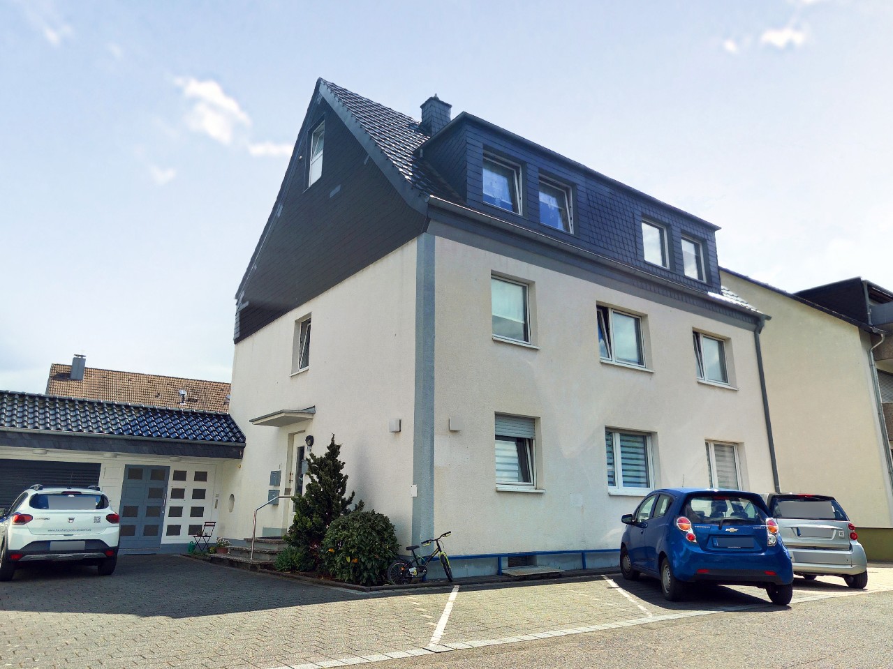 Vermietetes 3-Familienhaus + angebauter Bungalow in attraktiver Kombination