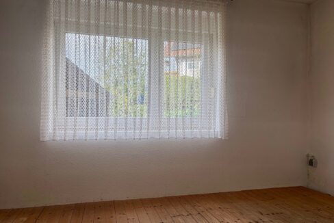 Arbeits-/Gästezimmer (KG)