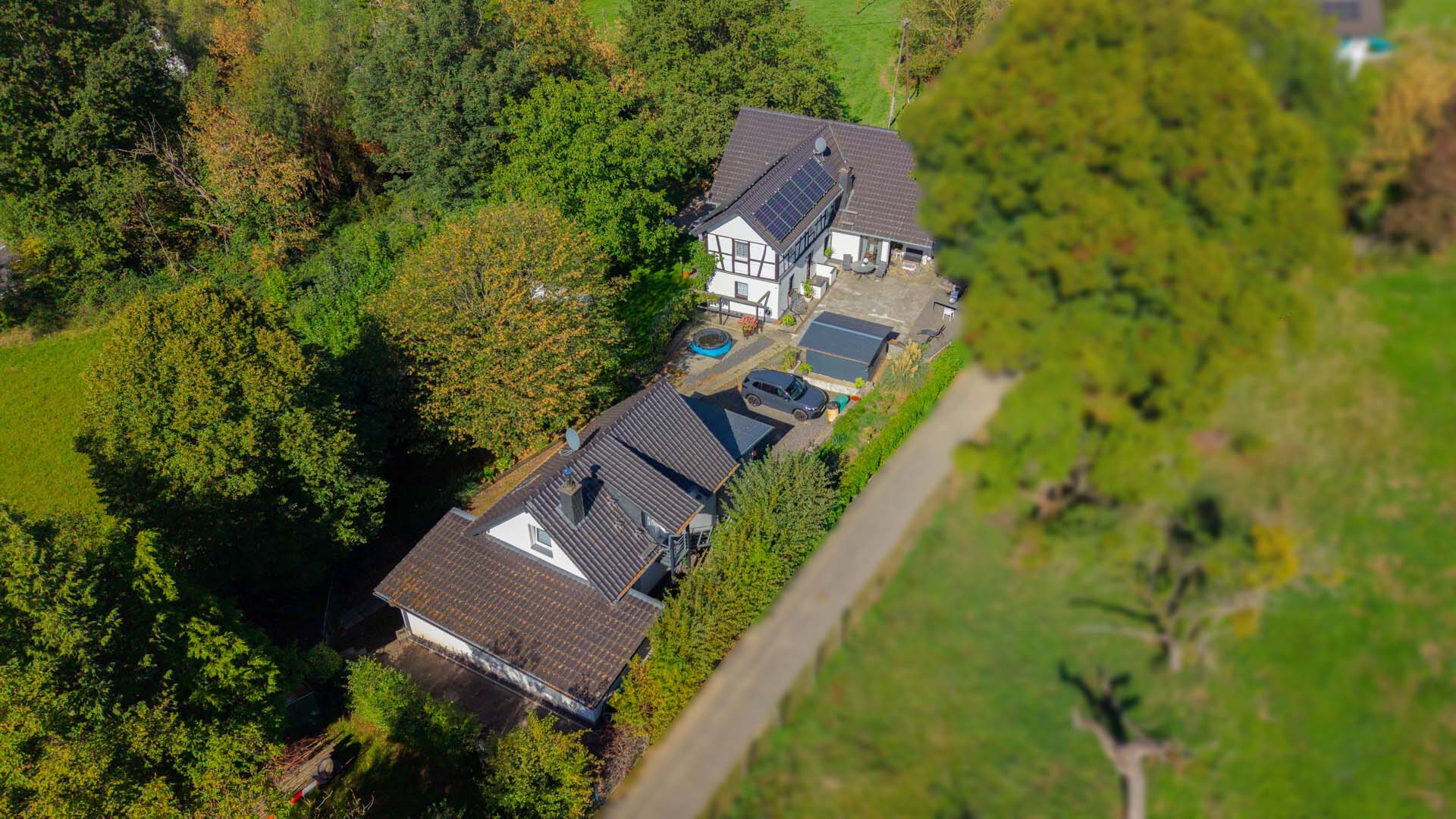 Naturnahes, attraktives Wohnensemble in Hennef-Käsberg – 3 Häuser auf einem ca. 5.143 m² Grundstücksareal!